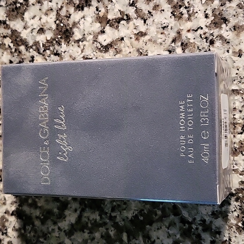 Women's dolce and Gabbana light blue 13 ounce